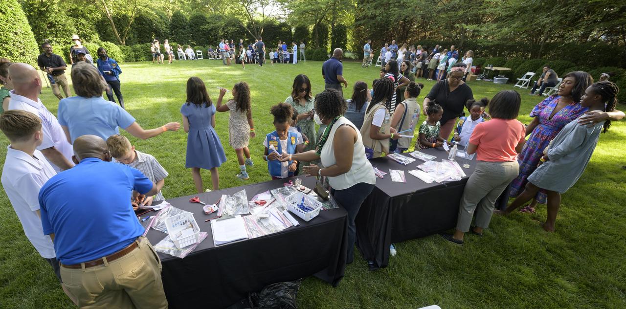 NASA astronauts and volunteers work hands-on STEM activities with students from 4th-8th grade on the grounds of the Vice President's residence at the Naval Observatory, Friday, June 17, 2022, in Washington. The Vice President and Second Gentleman hosted an evening of NASA STEM activities at the Naval Observatory for military families and local STEM students and their families, including a special screening of Disney Pixar’s Lightyear. Photo Credit: (NASA/Bill Ingalls)