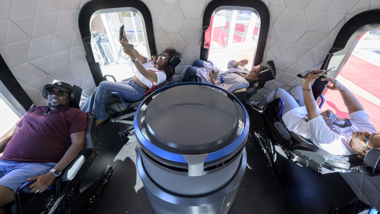 Attendees experience the inside of a Blue Origin New Shepard capsule mockup prior to the screening of the NASA produced documentary “The Color of Space” at Howard University’s Cramton Auditorium in Washington, Saturday, June 18, 2022. Premiering on Juneteenth, the federal holiday commemorating the end of slavery in the United States, “The Color of Space” is an inspirational documentary that tells the stories of NASA’s Black astronauts determined to reach the stars. Photo Credit: (NASA/Bill Ingalls)