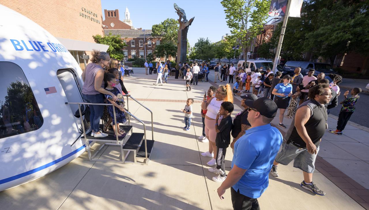 Attendees line up to go inside a Blue Origin New Shepard capsule mockup prior to the screening of the NASA produced documentary “The Color of Space” at Howard University’s Cramton Auditorium in Washington, Saturday, June 18, 2022. Premiering on Juneteenth, the federal holiday commemorating the end of slavery in the United States, “The Color of Space” is an inspirational documentary that tells the stories of NASA’s Black astronauts determined to reach the stars. Photo Credit: (NASA/Bill Ingalls)