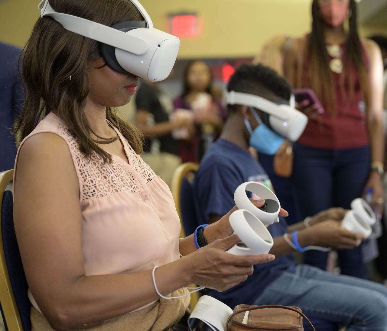 Attendees try on Oculus headsets and experience the International Space Station using virtual reality prior to the screening of the NASA produced documentary “The Color of Space” at Howard University’s Cramton Auditorium in Washington, Saturday, June 18, 2022. Premiering on Juneteenth, the federal holiday commemorating the end of slavery in the United States, “The Color of Space” is an inspirational documentary that tells the stories of NASA’s Black astronauts determined to reach the stars. Photo Credit: (NASA/Bill Ingalls)