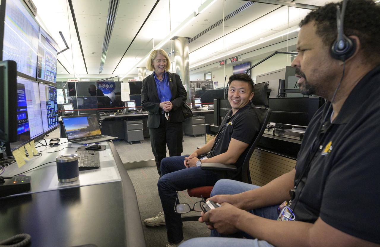 NASA Deputy Administrator Pam Melroy, left, meets with NASA James Webb Space Telescope Command Controllers Justin Truing, and Phil Johnson, right, during a tour of the NASA James Webb Space Telescope Mission Operations Center, Wednesday, June 29, 2022, at the Space Telescope Science Institute (STScI) in Baltimore. Prior to the tour the deputy spoke at a briefing that focused on the status of NASA’s James Webb Space Telescope in its final weeks of preparing for its science mission, as well as overviews of planned science for Webb’s first year of operations. Photo Credit: (NASA/Bill Ingalls)