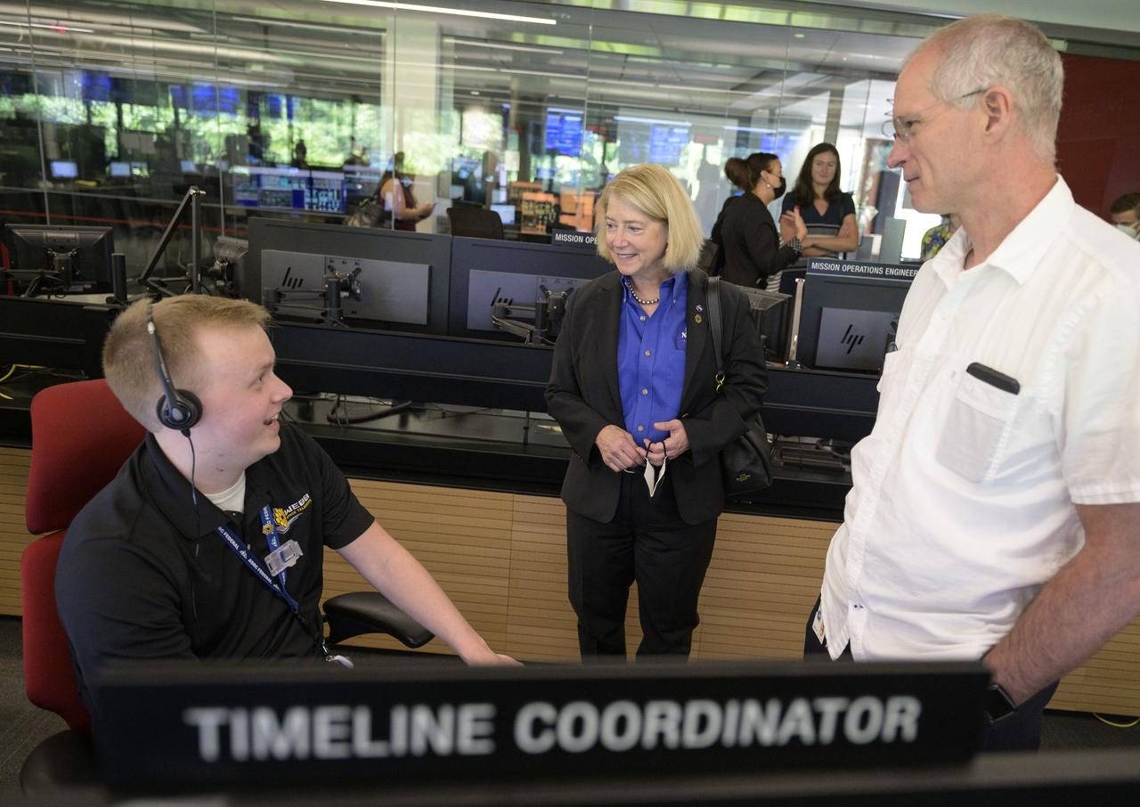 NASA Deputy Administrator Pam Melroy, center, meets with NASA James Webb Space Telescope Timeline Controller Matt Wasiak, left, and NASA James Webb Space Telescope Deputy Mission Operations Manager Ron Jones, right, during a tour of the NASA James Webb Space Telescope Mission Operations Center, Wednesday, June 29, 2022, at the Space Telescope Science Institute (STScI) in Baltimore. Prior to the tour the deputy spoke at a briefing that focused on the status of NASA’s James Webb Space Telescope in its final weeks of preparing for its science mission, as well as overviews of planned science for Webb’s first year of operations. Photo Credit: (NASA/Bill Ingalls)