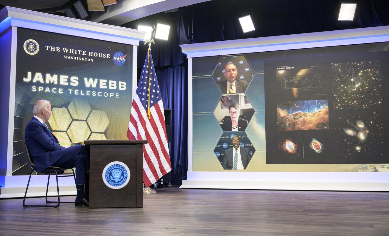 U.S. President Joe Biden previews images from NASA’s James Webb Space Telescope in a meeting, Monday, July 11, 2022, in the South Court Auditorium in the Eisenhower Executive Office Building on the White House complex in Washington. Joining the President on screen are NASA Associate Administrator for the Science Mission Directorate Thomas Zurbuchen, top, Deputy Director of the Space Telescope Science Institute (STScI) Nancy Levenson, and NASA James Webb Space Telescope Program Director Greg Robinson, bottom. Photo Credit: (NASA/Bill Ingalls)