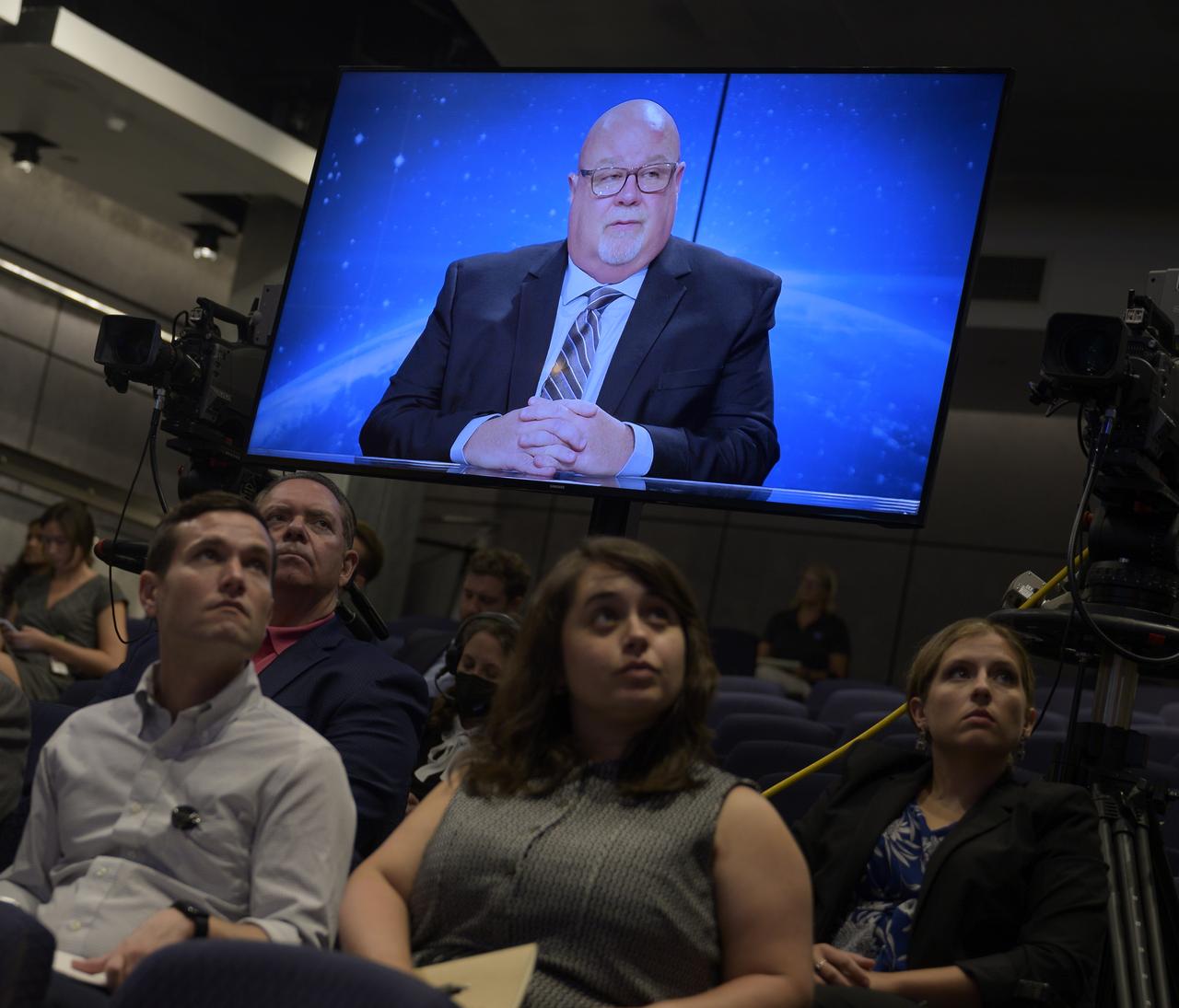 John Honeycutt, Space Launch System (SLS) program manager at NASA's Marshall Space Flight Center gives remarks remotely during a NASA briefing on the Artemis I Moon mission, Wednesday, Aug. 3, 2022, at the Mary W. Jackson NASA Headquarters building in Washington. NASA’s Artemis I mission is the first integrated test of the agency’s deep space exploration systems: the Orion spacecraft, Space Launch System rocket, and supporting ground systems. Launch of the uncrewed flight test is targeted for no earlier than Monday, Aug. 29. Photo Credit: (NASA/Bill Ingalls)