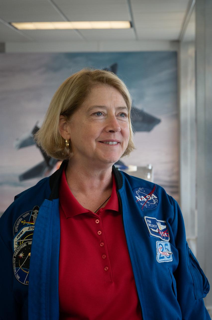 Deputy Administrator Pam Melroy tours the General Electric exhibit on Friday, July 29, 2022 at EAA AirVenture.