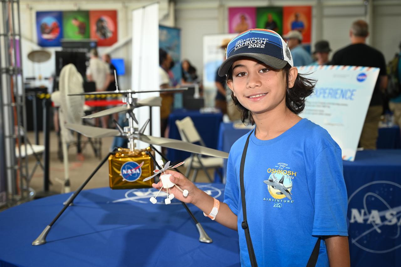 Ioannis Allan Torounidis shows off his interpretation of the Ingenuity Mars Helicopter on Wednesday, July 27, 2022 at AirVenture at Oshkosh.