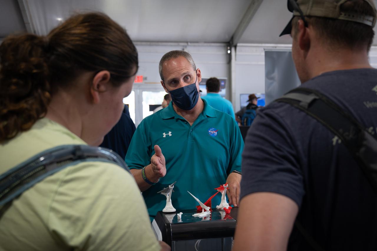 Steve Kirsche educates AirVenture visitors about the X-59 on Friday, July 29, 2022 in NASA's STEM Zone at AirVenture at Oshkosh