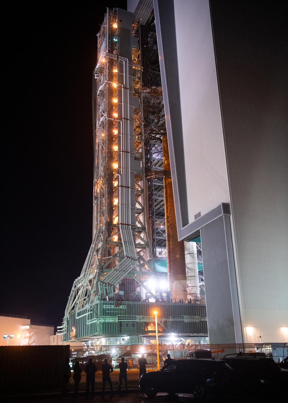 NASA’s Space Launch System (SLS) rocket with the Orion spacecraft aboard is seen atop the mobile launcher as it rolls out of the Vehicle Assembly Building to Launch Complex 39B, Tuesday, Aug. 16, 2022, at NASA’s Kennedy Space Center in Florida. NASA’s Artemis I mission is the first integrated test of the agency’s deep space exploration systems: the Orion spacecraft, SLS rocket, and supporting ground systems. Launch of the uncrewed flight test is targeted for no earlier than Aug. 29. Photo Credit: (NASA/Joel Kowsky)