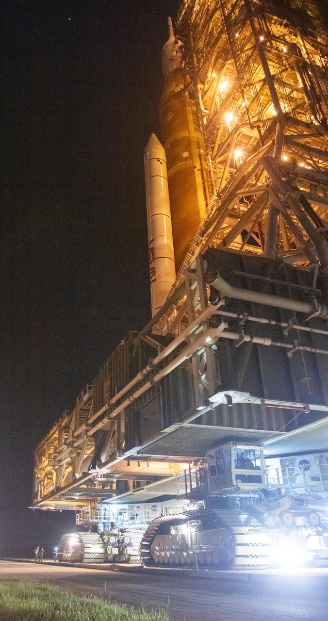 NASA’s Space Launch System (SLS) rocket with the Orion spacecraft aboard is seen atop the mobile launcher as it rolled out to Launch Pad 39B by Crawler-Transporter 2, Wednesday, Aug. 17, 2022, at NASA’s Kennedy Space Center in Florida. NASA’s Artemis I mission is the first integrated test of the agency’s deep space exploration systems: the Orion spacecraft, SLS rocket, and supporting ground systems. Launch of the uncrewed flight test is targeted for no earlier than Aug. 29. Photo Credit: (NASA/Joel Kowsky)