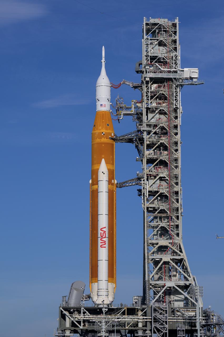 NASA’s Space Launch System (SLS) rocket with the Orion spacecraft aboard is seen atop a mobile launcher at Launch Pad 39B as preparations for launch continue, Saturday, Aug. 27, 2022, at NASA’s Kennedy Space Center in Florida. NASA’s Artemis I flight test is the first integrated test of the agency’s deep space exploration systems: the Orion spacecraft, SLS rocket, and supporting ground systems. Launch of the uncrewed flight test is targeted for no earlier than Aug. 29 at 8:33 a.m. ET. Photo Credit: (NASA/Bill Ingalls)