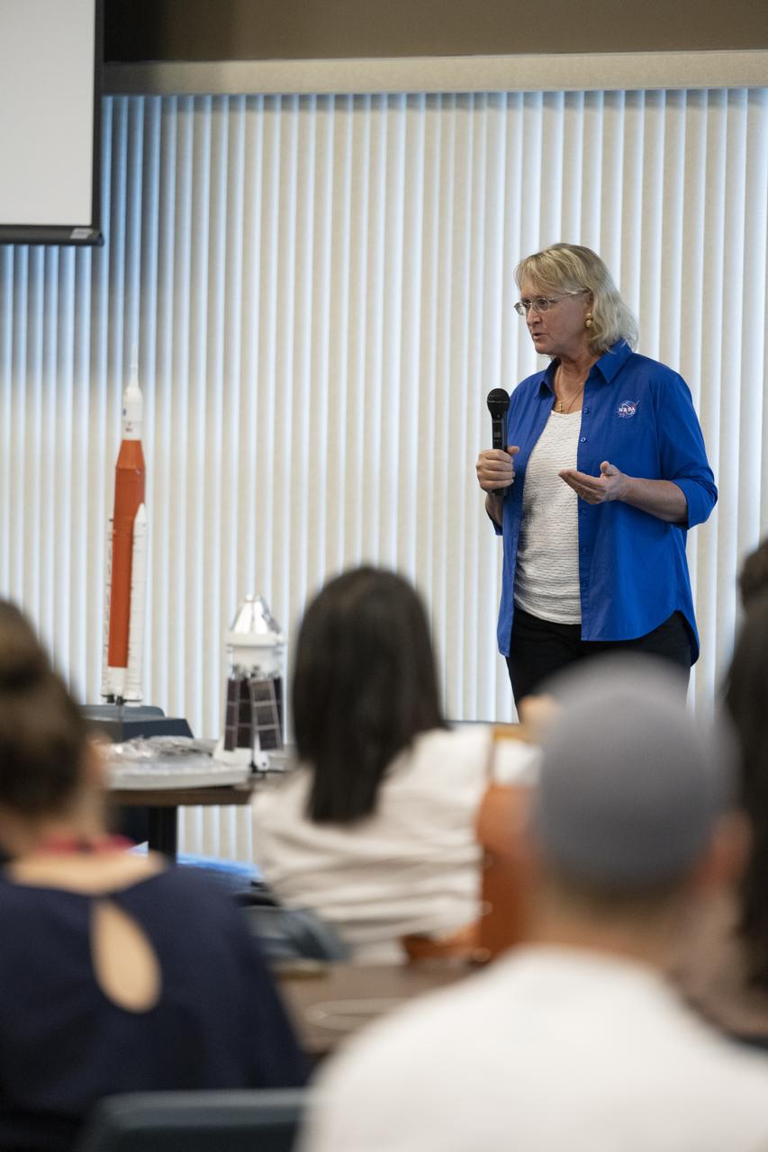 Orion Spacecraft Assembly Operation Lead Marie Reed delivers remarks during a panel discussion with NASA Social attendees, Saturday, Aug. 27, 2022, at the Space Station Processing Facility at NASA’s Kennedy Space Center in Florida. NASA’s Artemis I flight test is the first integrated flight test of the agency’s deep space exploration systems: the Orion spacecraft, Space Launch System (SLS) rocket, and ground systems. Launch of the uncrewed flight test is targeted for no earlier than Aug. 29 at 8:33 a.m. ET. Photo Credit: (NASA/Keegan Barber)