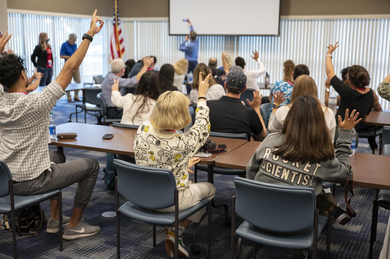Program Planner for the Orion Spacecraft at Lockheed Martin Space Barry Bohnsack takes a selfie with NASA Social attendees, Saturday, Aug. 27, 2022, at the Space Station Processing Facility at NASA’s Kennedy Space Center in Florida. NASA’s Artemis I flight test is the first integrated flight test of the agency’s deep space exploration systems: the Orion spacecraft, Space Launch System (SLS) rocket, and ground systems. Launch of the uncrewed flight test is targeted for no earlier than Aug. 29 at 8:33 a.m. ET. Photo Credit: (NASA/Keegan Barber)