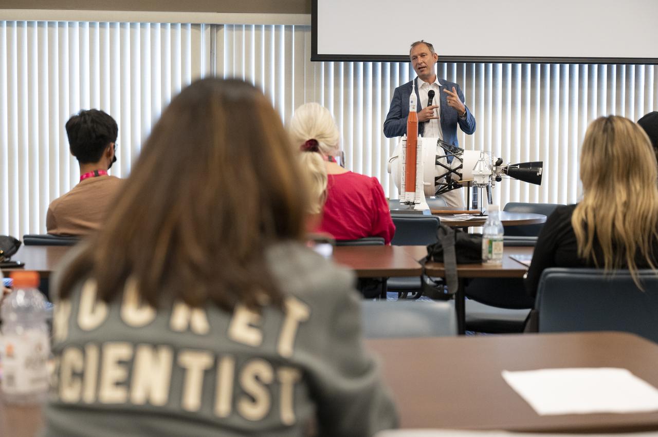 NASA Associate Administrator for the Science Mission Directorate Thomas Zurbuchen delivers remarks during a panel discussion with NASA Social attendees, Saturday, Aug. 27, 2022, at the Space Station Processing Facility at NASA’s Kennedy Space Center in Florida. NASA’s Artemis I flight test is the first integrated flight test of the agency’s deep space exploration systems: the Orion spacecraft, Space Launch System (SLS) rocket, and ground systems. Launch of the uncrewed flight test is targeted for no earlier than Aug. 29 at 8:33 a.m. ET. Photo Credit: (NASA/Keegan Barber)