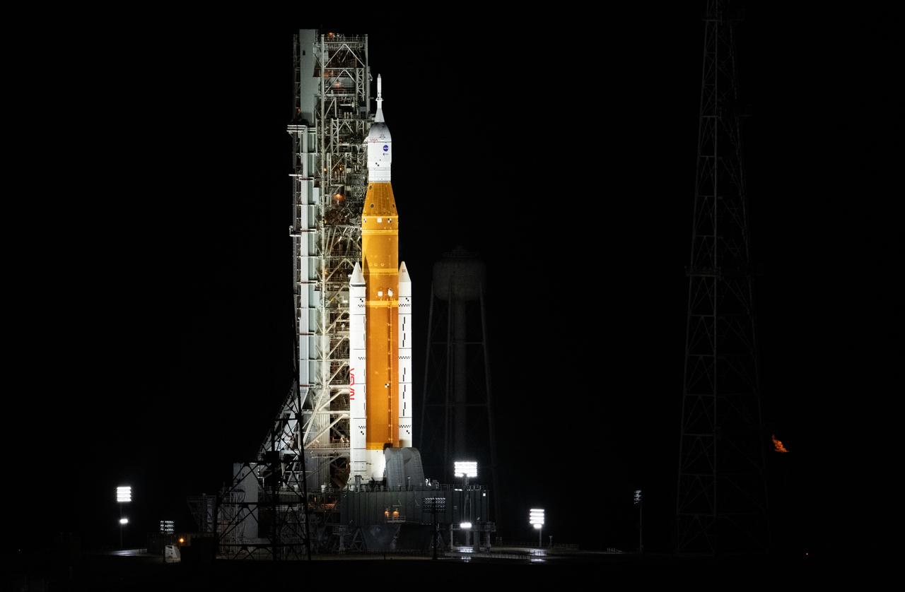 NASA’s Space Launch System (SLS) rocket with the Orion spacecraft aboard is seen atop the mobile launcher at Launch Pad 39B, Monday, Aug. 29, 2022, as the Artemis I launch teams load more than 700,000 gallons of cryogenic propellants including liquid hydrogen and liquid oxygen as the launch countdown progresses at NASA’s Kennedy Space Center in Florida. NASA’s Artemis I flight test is the first integrated test of the agency’s deep space exploration systems: the Orion spacecraft, SLS rocket, and supporting ground systems. Launch of the uncrewed flight test is targeted for 8:33 a.m. ET.  Photo Credit: (NASA/Joel Kowsky)