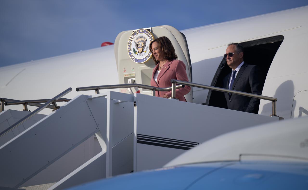 Vice President Kamala Harris and Second Gentleman Doug Emhoff exit their aircraft after landing at the Launch and Landing Facility at NASA’s Kennedy Space Center ahead of the launch of Artemis I, Monday, Aug. 29, 2022, in Florida. NASA’s Artemis I flight test is the first integrated flight test of the agency’s deep space exploration systems: the Orion spacecraft, Space Launch System (SLS) rocket, and ground systems. Photo Credit: (NASA/Bill Ingalls)