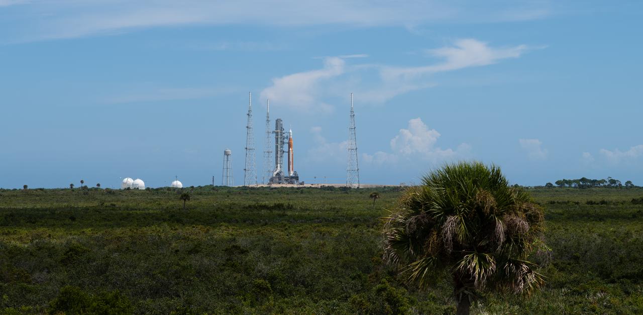 NASA’s Space Launch System (SLS) rocket with the Orion spacecraft aboard is seen atop the mobile launcher at Launch Pad 39B, Tuesday, Aug. 30, 2022, at NASA’s Kennedy Space Center in Florida. NASA’s Artemis I flight test is the first integrated test of the agency’s deep space exploration systems: the Orion spacecraft, SLS rocket, and supporting ground systems. Photo Credit: (NASA/Joel Kowsky)