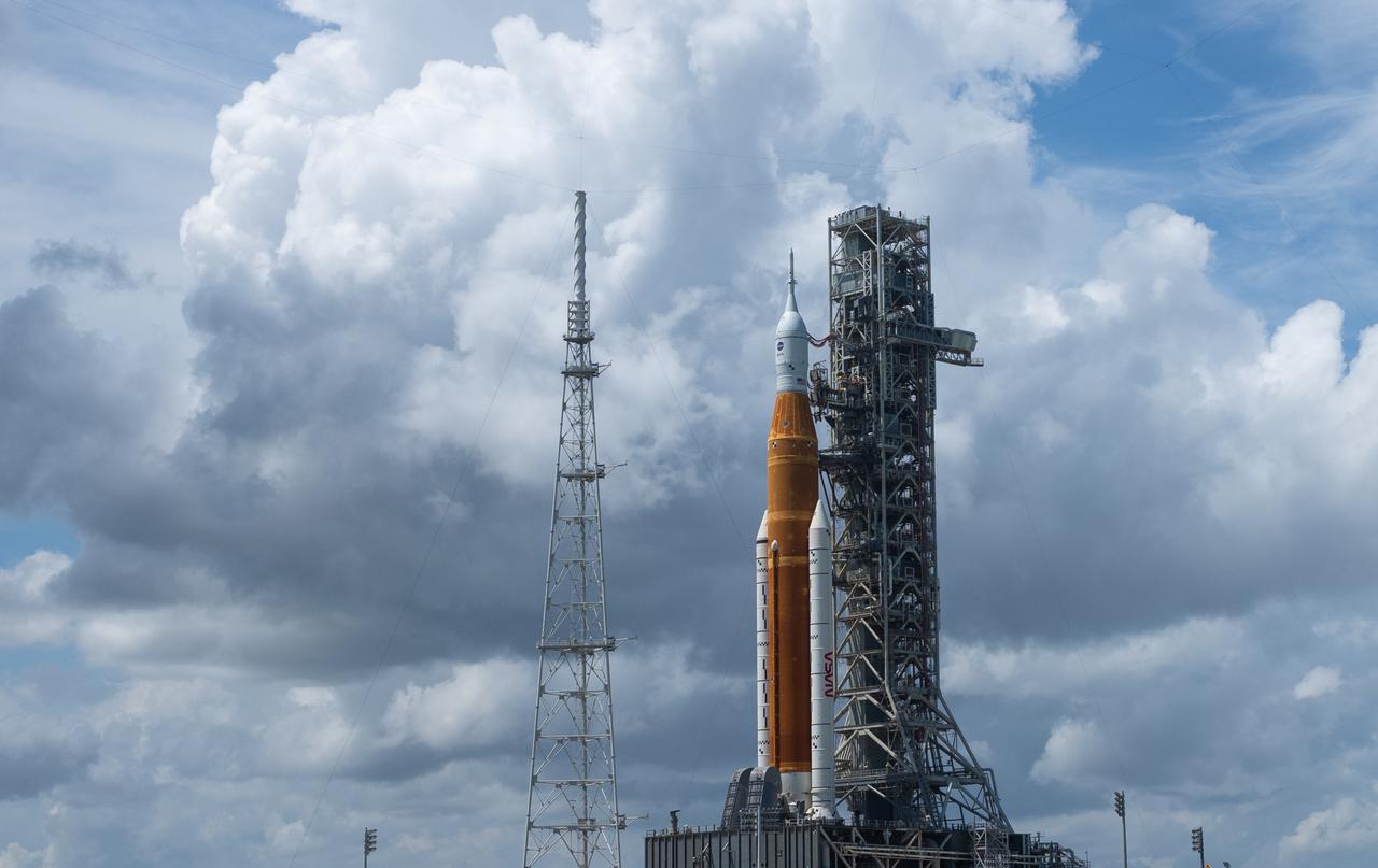 NASA’s Space Launch System (SLS) rocket with the Orion spacecraft aboard is seen atop the mobile launcher at Launch Pad 39B, Tuesday, Aug. 30, 2022, at NASA’s Kennedy Space Center in Florida. NASA’s Artemis I flight test is the first integrated test of the agency’s deep space exploration systems: the Orion spacecraft, SLS rocket, and supporting ground systems. Photo Credit: (NASA/Joel Kowsky)