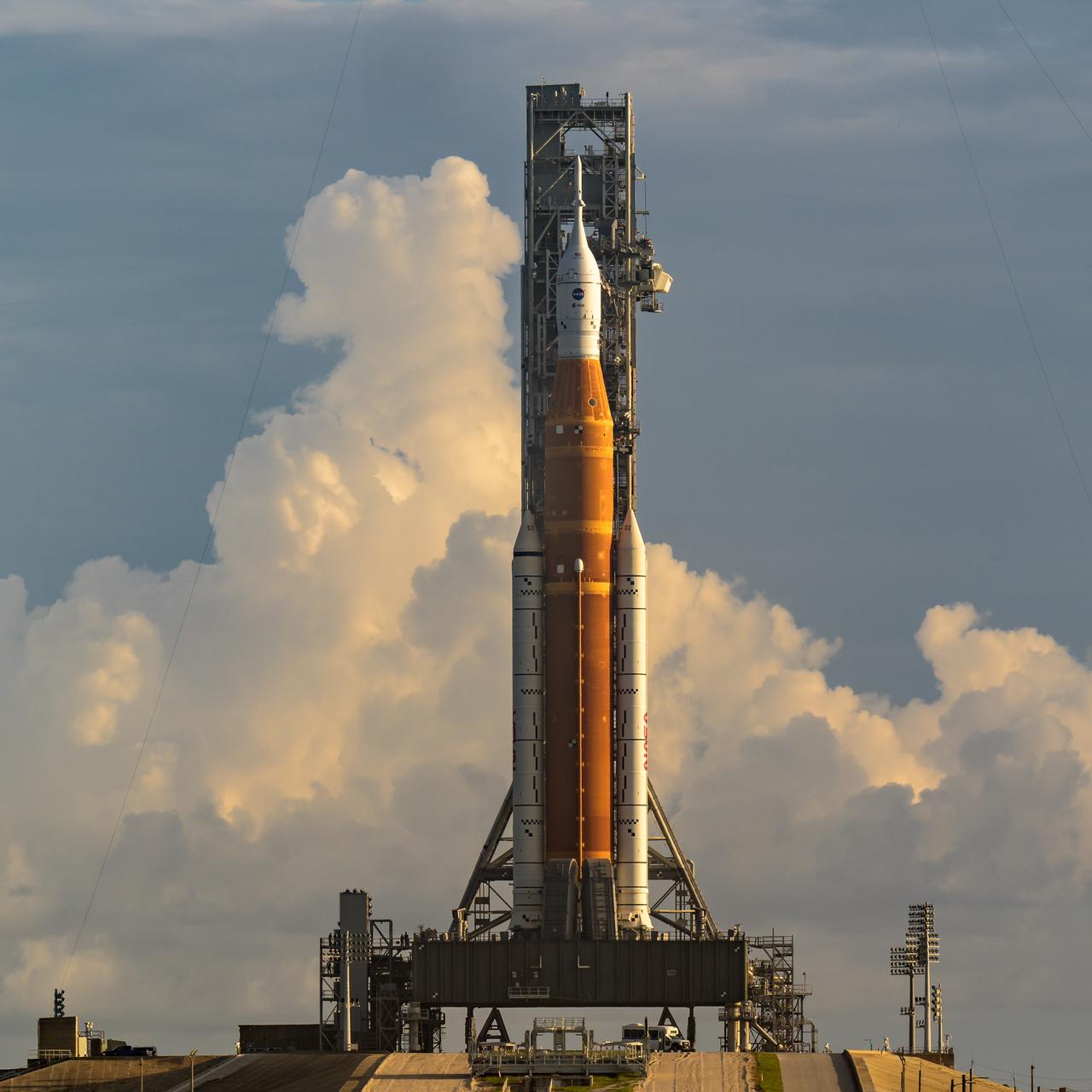 NASA’s Space Launch System (SLS) rocket with the Orion spacecraft aboard is seen atop a mobile launcher at Launch Pad 39B as preparations for launch continue, Friday, Sept. 2, 2022, at NASA’s Kennedy Space Center in Florida. NASA’s Artemis I flight test is the first integrated test of the agency’s deep space exploration systems: the Orion spacecraft, SLS rocket, and supporting ground systems. Launch of the uncrewed flight test is targeted for Sept. 3 at 2:17 p.m. EDT. Photo Credit: (NASA/Bill Ingalls)