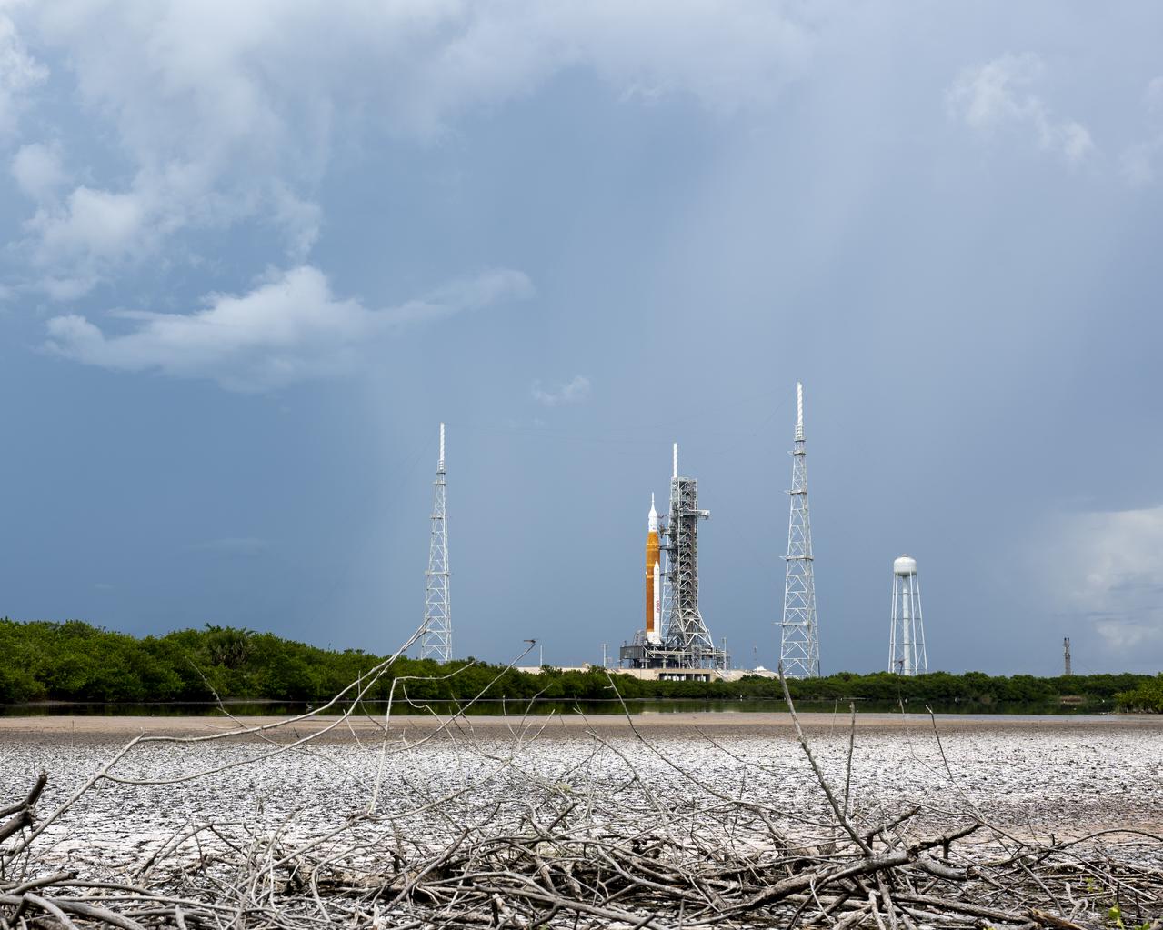 NASA’s Space Launch System (SLS) rocket with the Orion spacecraft aboard is seen atop a mobile launcher at Launch Pad 39B as preparations for launch continue, Friday, Sept. 2, 2022, at NASA’s Kennedy Space Center in Florida. NASA’s Artemis I flight test is the first integrated test of the agency’s deep space exploration systems: the Orion spacecraft, SLS rocket, and supporting ground systems. Launch of the uncrewed flight test is targeted for Sept. 3 at 2:17 p.m. EDT. Photo Credit: (NASA/Keegan Barber)