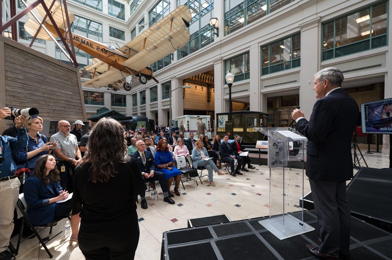 NASA Associate Administrator and former astronaut Bob Cabana provides remarks at the first-day-of-issue event for the United States Postal Service’s new stamp celebrating NASA’s James Webb Space Telescope (JWST) on Thursday, Sept. 8, 2022, at the Smithsonian’s National Postal Museum in Washington. The stamp, which features an illustration of the observatory, honors Webb’s mission to explore the unknown in our universe – solving mysteries in our solar system, looking beyond to distant worlds around other stars, and probing the structures and origins of our universe and our place in it. Photo Credit: (NASA/Aubrey Gemignani)