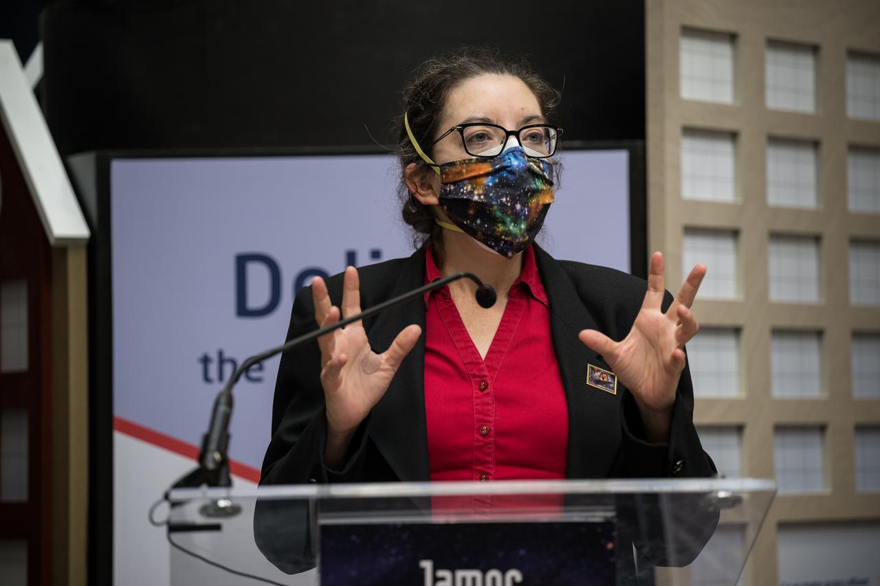 NASA’s Goddard Space Flight Center Webb Deputy Observatory Project Scientist, Erin Smith, provides remarks at the first-day-of-issue event for the United States Postal Service’s new stamp celebrating NASA’s James Webb Space Telescope (JWST) on Thursday, Sept. 8, 2022, at the Smithsonian’s National Postal Museum in Washington. The stamp, which features an illustration of the observatory, honors Webb’s mission to explore the unknown in our universe – solving mysteries in our solar system, looking beyond to distant worlds around other stars, and probing the structures and origins of our universe and our place in it. Photo Credit: (NASA/Aubrey Gemignani)