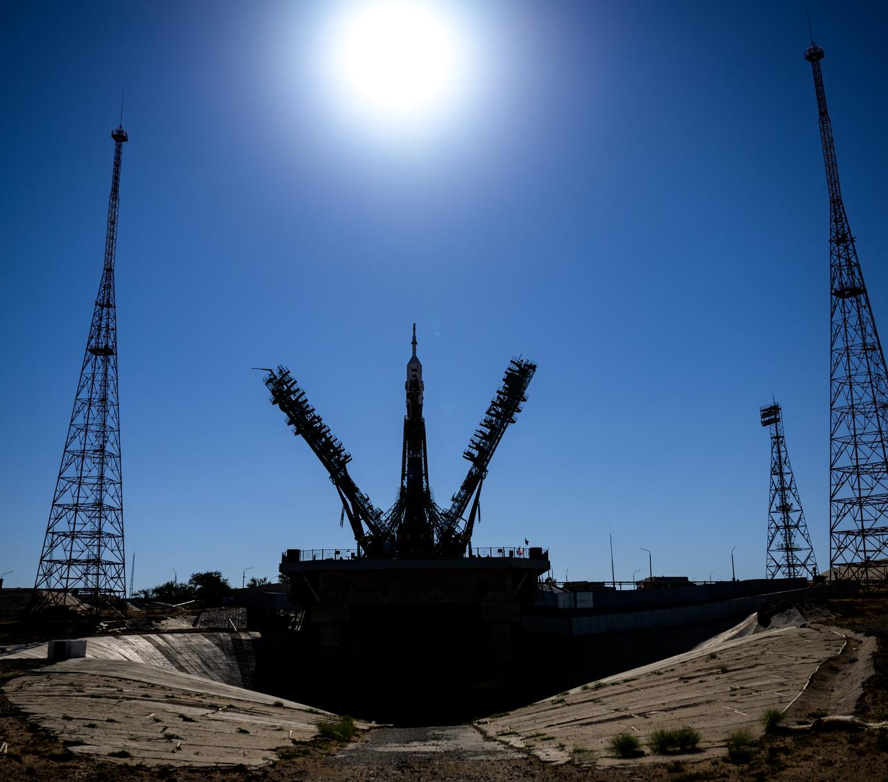 The service structure is raised into position around the Soyuz rocket, Sunday, Sept. 18, 2022, at site 31 of the Baikonur Cosmodrome in Kazakhstan. Expedition 68 astronaut Frank Rubio of NASA, and cosmonauts Sergey Prokopyev and Dmitri Petelin of Roscosmos are scheduled to launch aboard their Soyuz MS-22 spacecraft on Sept. 21. Photo Credit: (NASA/Bill Ingalls)