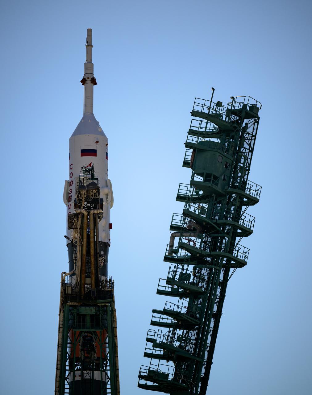 The service structure is raised into position around the Soyuz rocket, Sunday, Sept. 18, 2022, at site 31 of the Baikonur Cosmodrome in Kazakhstan. Expedition 68 astronaut Frank Rubio of NASA, and cosmonauts Sergey Prokopyev and Dmitri Petelin of Roscosmos are scheduled to launch aboard their Soyuz MS-22 spacecraft on Sept. 21. Photo Credit: (NASA/Bill Ingalls)