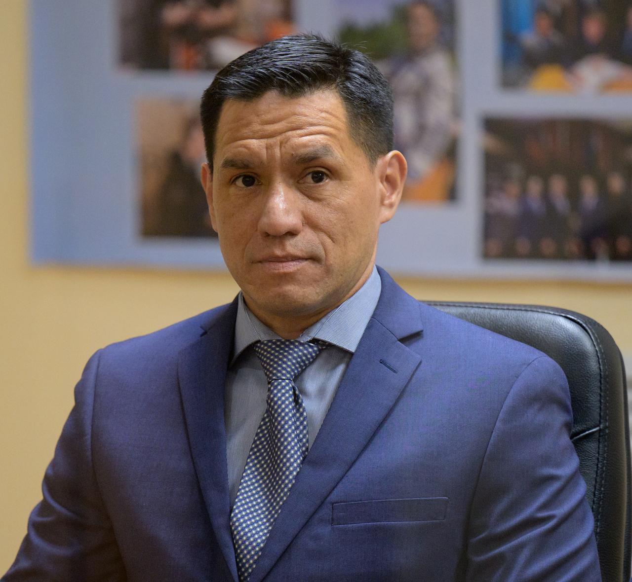 Expedition 68 astronaut Frank Rubio of NASA is seen during the State Commission meeting to approve the Soyuz launch with he and his crewmates, cosmonauts Sergey Prokopyev and Dmitri Petelin of Roscosmos, Tuesday, Sept. 20, 2022, at the Cosmonaut Hotel in Baikonur, Kazakhstan. The trio are scheduled to launch to the International Space Station aboard the Soyuz MS-22 spacecraft on Sept. 21. Photo Credit: (NASA/Bill Ingalls)