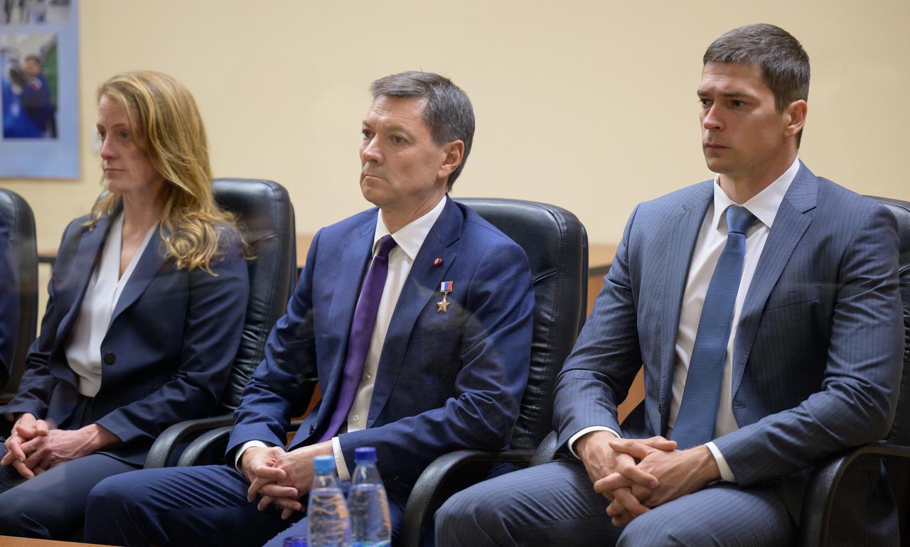 Expedition 68 backup crewmembers Loral O'Hara of NASA, left, Oleg Kononenko and Nikolai Chub of Roscosmos, right, are seen during the State Commission meeting to approve the Soyuz launch of Expedition 68 to the International Space Station, Tuesday, Sept. 20, 2022, at the Cosmonaut Hotel in Baikonur, Kazakhstan. Expedition 68 astronaut Frank Rubio of NASA, and cosmonauts Sergey Prokopyev and Dmitri Petelin of Roscosmos, are scheduled to launch to the International Space Station aboard the Soyuz MS-22 spacecraft on Sept. 21. Photo Credit: (NASA/Bill Ingalls)