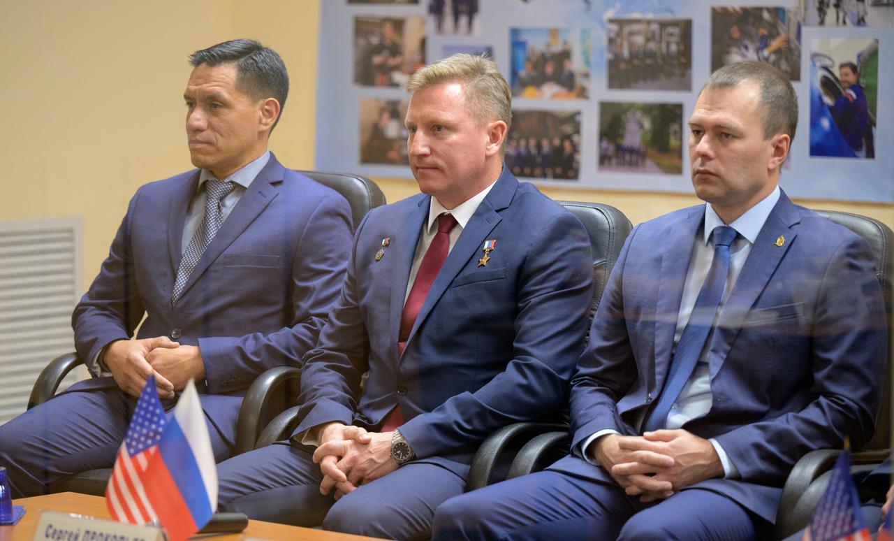 Expedition 68 astronaut Frank Rubio of NASA, left, and cosmonauts Sergey Prokopyev and Dmitri Petelin of Roscosmos, right, are seen during the State Commission meeting to approve the Soyuz launch to the International Space Station, Tuesday, Sept. 20, 2022, at the Cosmonaut Hotel in Baikonur, Kazakhstan. The trio are scheduled to launch to the International Space Station aboard the Soyuz MS-22 spacecraft on Sept. 21. Photo Credit: (NASA/Bill Ingalls)
