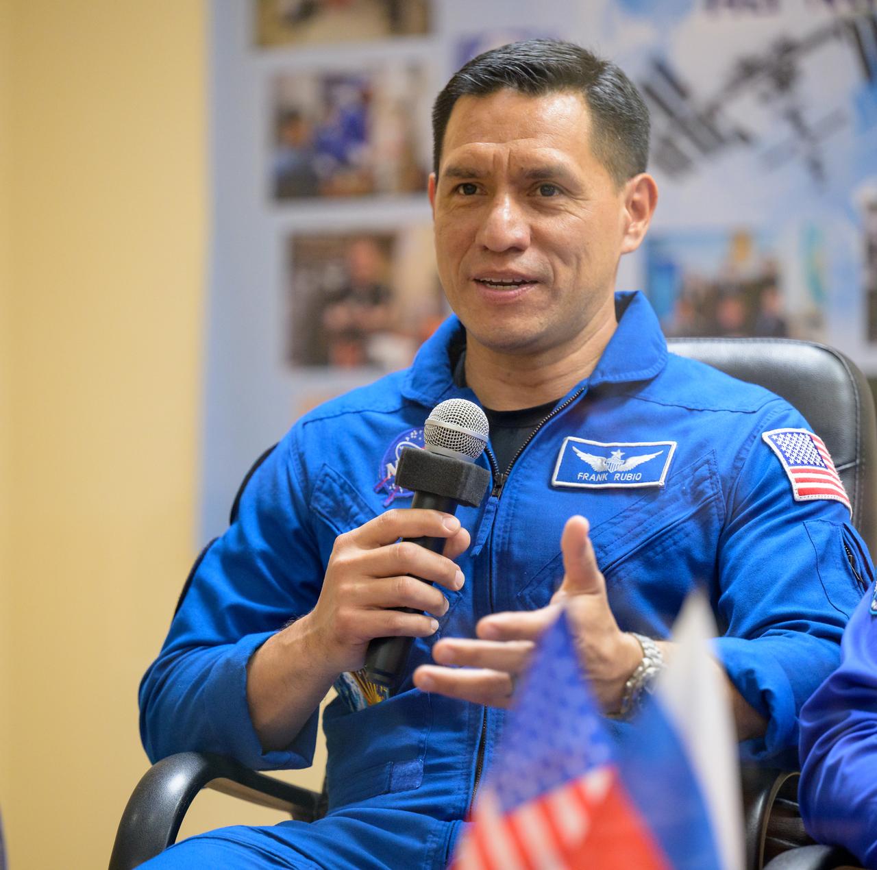 Expedition 68 astronaut Frank Rubio of NASA is seen in quarantine, behind glass, during a press conference, Tuesday, Sept. 20, 2022, at the Cosmonaut Hotel in Baikonur, Kazakhstan. Rubio, and cosmonauts Sergey Prokopyev and Dmitri Petelin of Roscosmos, are scheduled to launch to the International Space Station aboard the Soyuz MS-22 spacecraft on Sept. 21. Photo Credit: (NASA/Bill Ingalls)