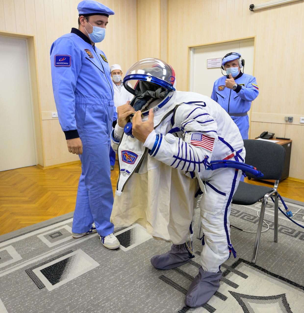 Expedition 68 astronaut Frank Rubio of NASA dons his Russian Sokol suit as he and fellow crewmates Sergey Prokopyev, and Dmitri Petelin of Roscosmos, prepare for their Soyuz MS-22 spacecraft launch, Wednesday, Sept. 21, 2022, in Baikonur, Kazakhstan. Rubio, Prokopyev and Petelin launched onboard the Soyuz rocket from the Baikonur Cosmodrome for a mission on the International Space Station. Photo Credit: (NASA/Bill Ingalls)