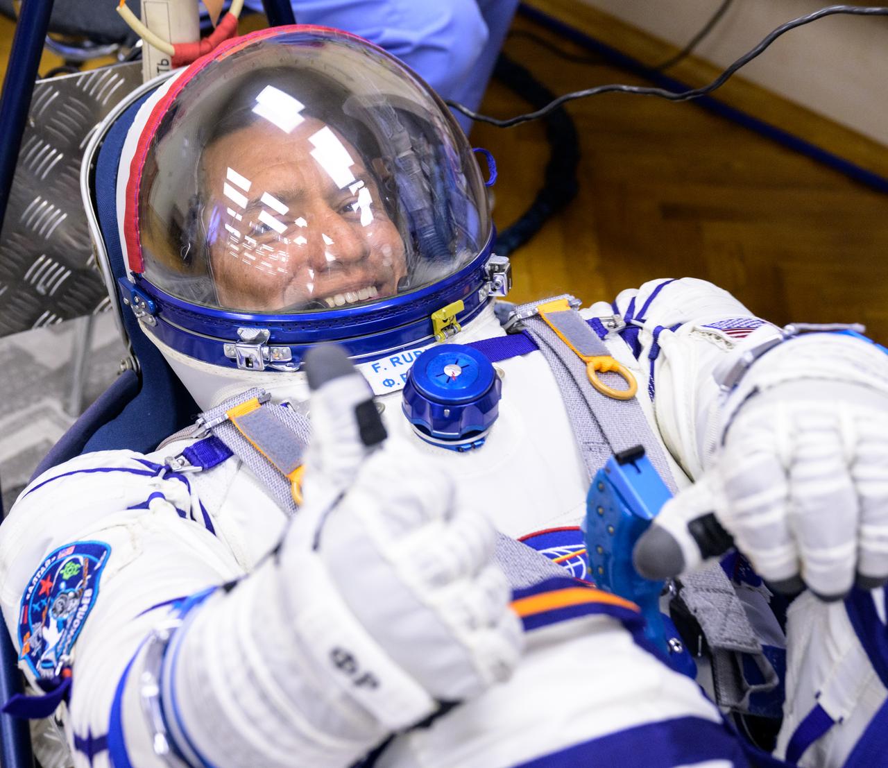 Expedition 68 astronaut Frank Rubio of NASA has his Russian Sokol suit pressure checked as he and fellow crewmates, Sergey Prokopyev and Dmitri Petelin of Roscosmos, prepare for their Soyuz MS-22 spacecraft launch, Wednesday, Sept. 21, 2022, in Baikonur, Kazakhstan. Rubio, Prokopyev and Petelin launched onboard the Soyuz rocket from the Baikonur Cosmodrome for a mission on the International Space Station. Photo Credit: (NASA/Bill Ingalls)