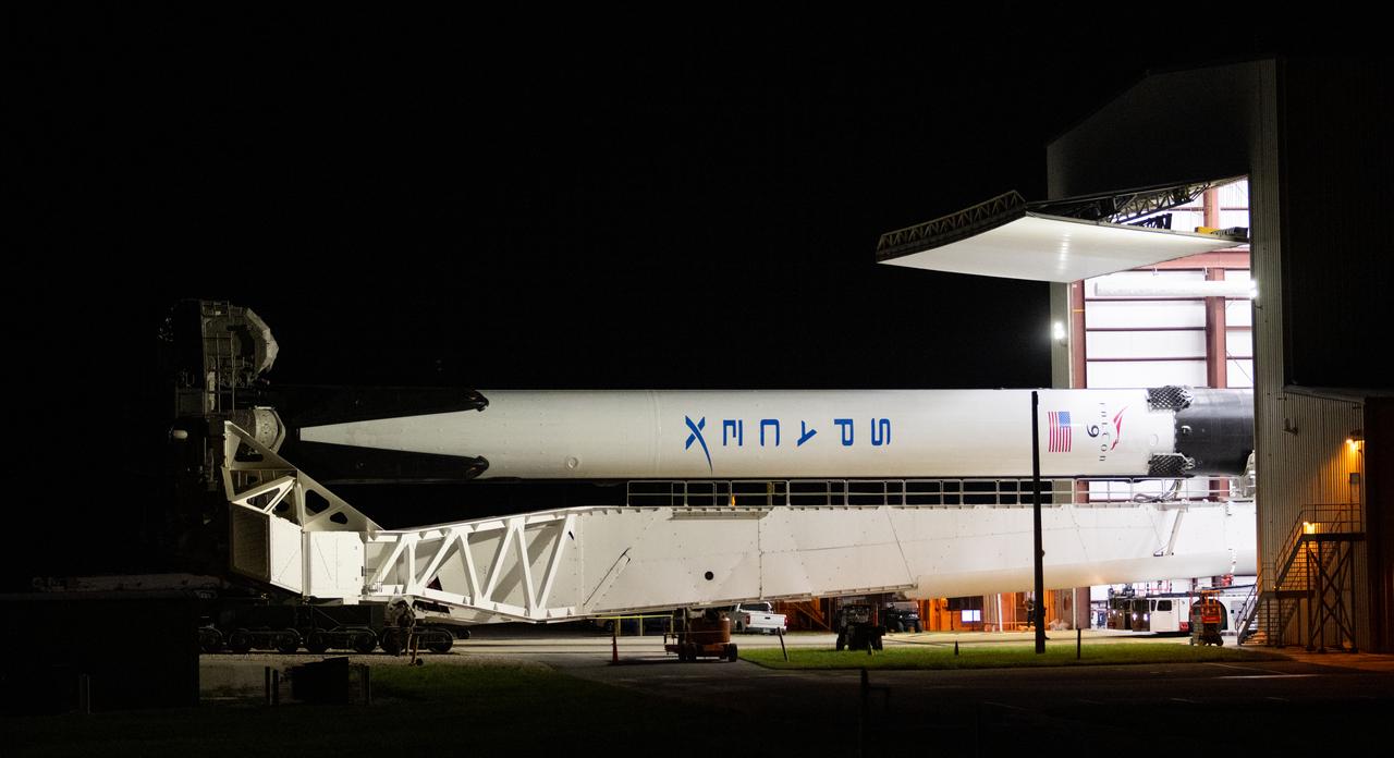 A SpaceX Falcon 9 rocket with the company's Crew Dragon spacecraft onboard is seen as it is rolled out to the launch pad at Launch Complex 39A as preparations continue for the Crew-5 mission, Saturday, Oct. 1, 2022, at NASA’s Kennedy Space Center in Florida. NASA’s SpaceX Crew-5 mission is the fifth crew rotation mission of the SpaceX Crew Dragon spacecraft and Falcon 9 rocket to the International Space Station as part of the agency’s Commercial Crew Program. NASA astronauts Nicole Mann and Josh Cassada, Japan Aerospace Exploration Agency (JAXA) astronaut Koichi Wakata, and Roscosmos cosmonaut Anna Kikina are scheduled to launch at 12:00 p.m. EDT on Oct. 5, from Launch Complex 39A at the Kennedy Space Center. Photo Credit: (NASA/Joel Kowsky)