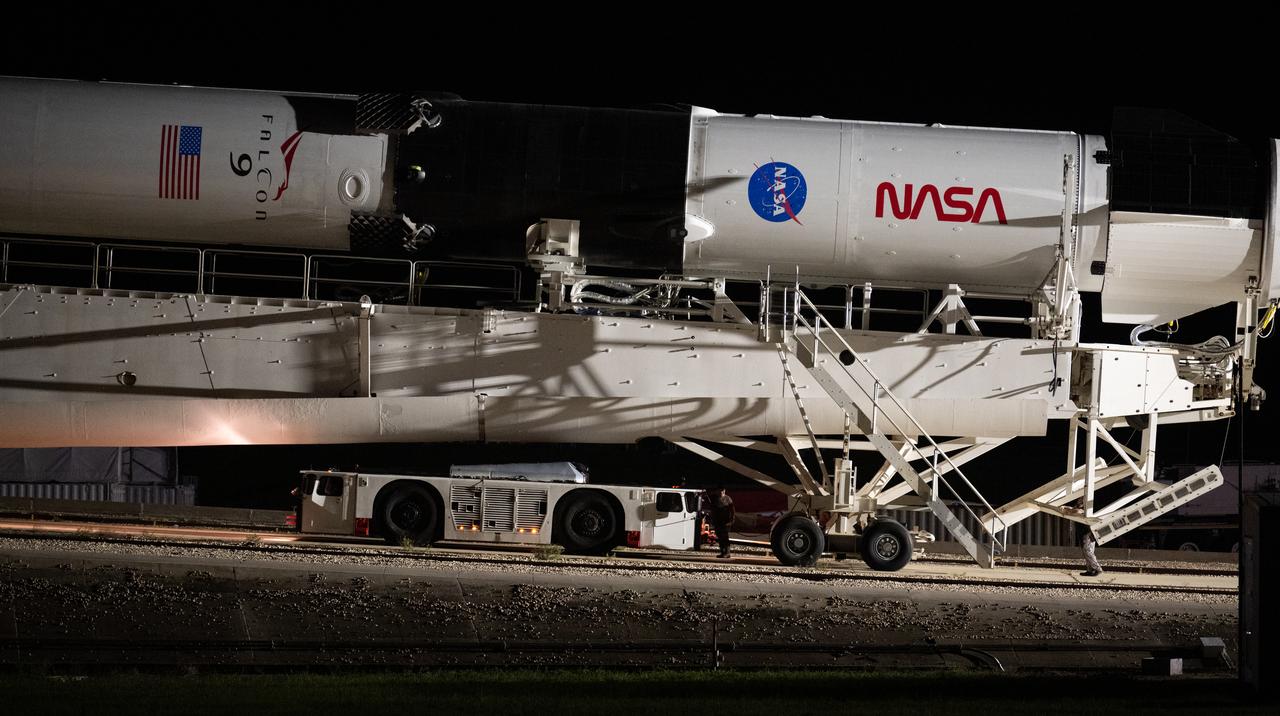A SpaceX Falcon 9 rocket with the company's Crew Dragon spacecraft onboard is seen as it is rolled out to the launch pad at Launch Complex 39A as preparations continue for the Crew-5 mission, Saturday, Oct. 1, 2022, at NASA’s Kennedy Space Center in Florida. NASA’s SpaceX Crew-5 mission is the fifth crew rotation mission of the SpaceX Crew Dragon spacecraft and Falcon 9 rocket to the International Space Station as part of the agency’s Commercial Crew Program. NASA astronauts Nicole Mann and Josh Cassada, Japan Aerospace Exploration Agency (JAXA) astronaut Koichi Wakata, and Roscosmos cosmonaut Anna Kikina are scheduled to launch at 12:00 p.m. EDT on Oct. 5, from Launch Complex 39A at the Kennedy Space Center. Photo Credit: (NASA/Joel Kowsky)
