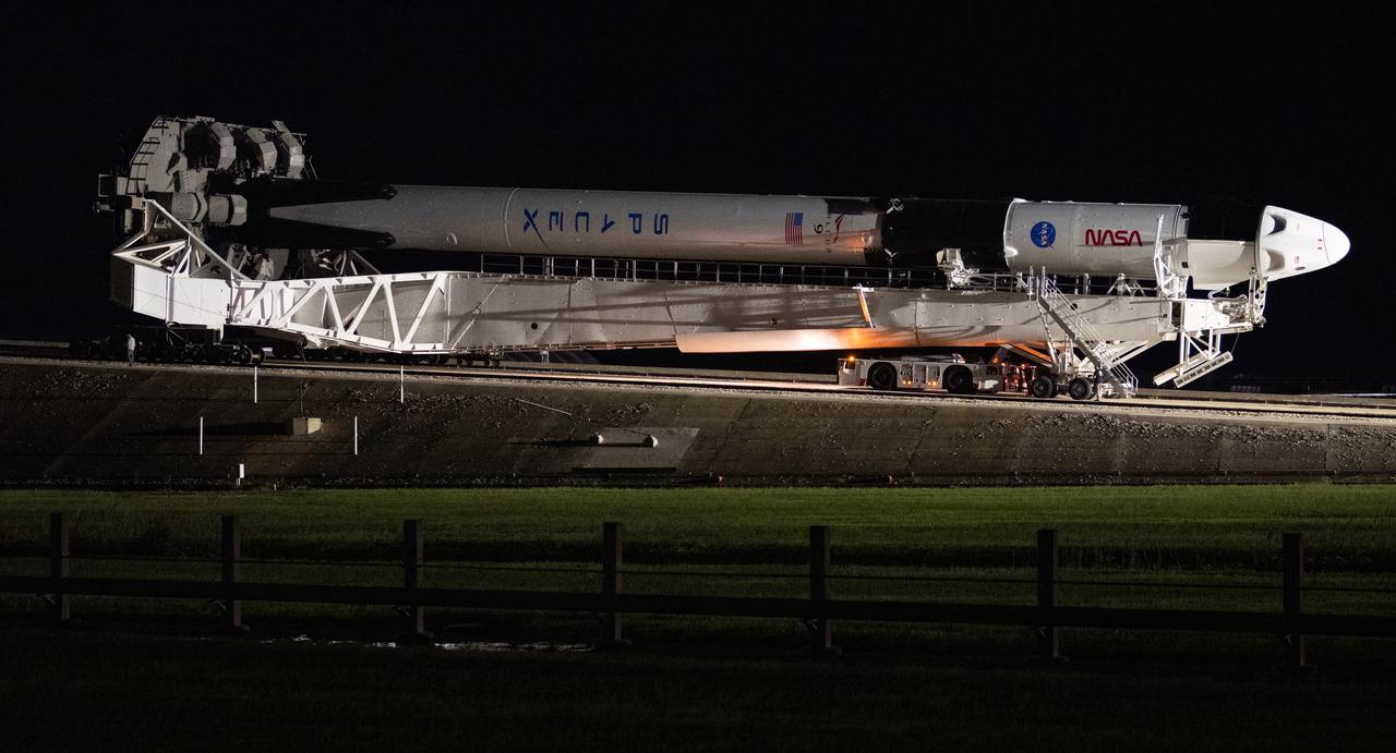 A SpaceX Falcon 9 rocket with the company's Crew Dragon spacecraft onboard is seen as it is rolled out to the launch pad at Launch Complex 39A as preparations continue for the Crew-5 mission, Saturday, Oct. 1, 2022, at NASA’s Kennedy Space Center in Florida. NASA’s SpaceX Crew-5 mission is the fifth crew rotation mission of the SpaceX Crew Dragon spacecraft and Falcon 9 rocket to the International Space Station as part of the agency’s Commercial Crew Program. NASA astronauts Nicole Mann and Josh Cassada, Japan Aerospace Exploration Agency (JAXA) astronaut Koichi Wakata, and Roscosmos cosmonaut Anna Kikina are scheduled to launch at 12:00 p.m. EDT on Oct. 5, from Launch Complex 39A at the Kennedy Space Center. Photo Credit: (NASA/Joel Kowsky)