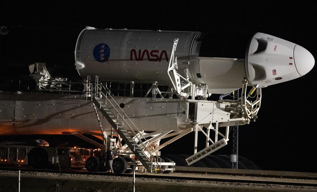 A SpaceX Falcon 9 rocket with the company's Crew Dragon spacecraft onboard is seen as it is rolled out to the launch pad at Launch Complex 39A as preparations continue for the Crew-5 mission, Saturday, Oct. 1, 2022, at NASA’s Kennedy Space Center in Florida. NASA’s SpaceX Crew-5 mission is the fifth crew rotation mission of the SpaceX Crew Dragon spacecraft and Falcon 9 rocket to the International Space Station as part of the agency’s Commercial Crew Program. NASA astronauts Nicole Mann and Josh Cassada, Japan Aerospace Exploration Agency (JAXA) astronaut Koichi Wakata, and Roscosmos cosmonaut Anna Kikina are scheduled to launch at 12:00 p.m. EDT on Oct. 5, from Launch Complex 39A at the Kennedy Space Center. Photo Credit: (NASA/Joel Kowsky)