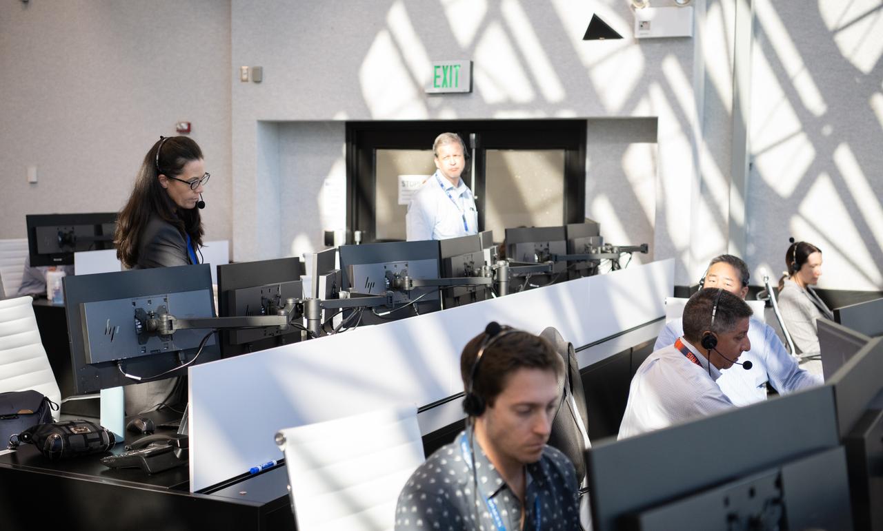 Emily Nelson, NASA's chief flight director, left, Richard Jones, manager of the Mission Management and Integration Office for NASA's Commercial Crew Program, center right, are seen as they monitor the countdown during a dress rehearsal in preparation for the launch of a SpaceX Falcon 9 rocket carrying the company's Crew Dragon spacecraft on NASA’s SpaceX Crew-5 mission with NASA astronauts Nicole Mann and Josh Cassada, Japan Aerospace Exploration Agency (JAXA) astronaut Koichi Wakata, and Roscosmos cosmonaut Anna Kikina onboard, Sunday, Oct. 2, 2022, in firing room four of the Rocco A. Petrone Launch Control Center at NASA’s Kennedy Space Center in Florida. NASA’s SpaceX Crew-5 mission is the fifth crew rotation mission of the SpaceX Crew Dragon spacecraft and Falcon 9 rocket to the International Space Station as part of the agency’s Commercial Crew Program. Mann, Cassada, Wakata, and Kikini are scheduled to launch at 12:00 p.m. EDT on Oct. 5, from Launch Complex 39A at the Kennedy Space Center. Photo Credit: (NASA/Joel Kowsky)