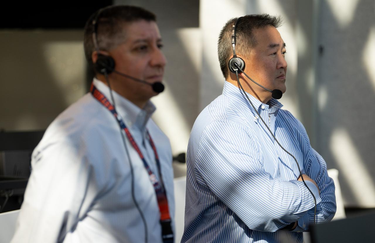 Ven Feng, deputy program manager for NASA's Commercial Crew Program, right, and Richard Jones, manager of the Mission Management and Integration Office for NASA's Commercial Crew Program, monitor the countdown during a dress rehearsal in preparation for the launch of a SpaceX Falcon 9 rocket carrying the company's Crew Dragon spacecraft on NASA’s SpaceX Crew-5 mission with NASA astronauts Nicole Mann and Josh Cassada, Japan Aerospace Exploration Agency (JAXA) astronaut Koichi Wakata, and Roscosmos cosmonaut Anna Kikina onboard, Sunday, Oct. 2, 2022, in firing room four of the Rocco A. Petrone Launch Control Center at NASA’s Kennedy Space Center in Florida. NASA’s SpaceX Crew-5 mission is the fifth crew rotation mission of the SpaceX Crew Dragon spacecraft and Falcon 9 rocket to the International Space Station as part of the agency’s Commercial Crew Program. Mann, Cassada, Wakata, and Kikini are scheduled to launch at 12:00 p.m. EDT on Oct. 5, from Launch Complex 39A at the Kennedy Space Center. Photo Credit: (NASA/Joel Kowsky)