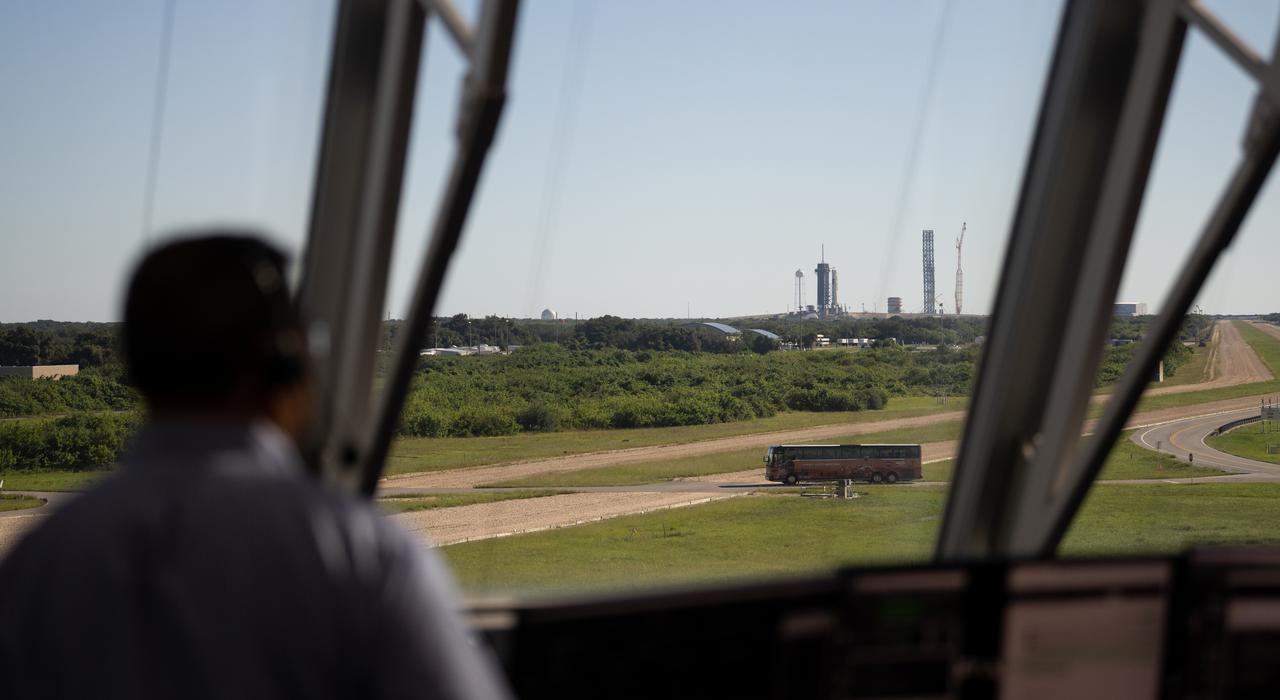The SpaceX Falcon 9 and Crew Dragon spacecraft are seen from inside firing room four during a dress rehearsal in preparation for the launch on NASA’s SpaceX Crew-5 mission with NASA astronauts Nicole Mann and Josh Cassada, Japan Aerospace Exploration Agency (JAXA) astronaut Koichi Wakata, and Roscosmos cosmonaut Anna Kikina onboard, Sunday, Oct. 2, 2022, in firing room four of the Rocco A. Petrone Launch Control Center at NASA’s Kennedy Space Center in Florida. NASA’s SpaceX Crew-5 mission is the fifth crew rotation mission of the SpaceX Crew Dragon spacecraft and Falcon 9 rocket to the International Space Station as part of the agency’s Commercial Crew Program. Mann, Cassada, Wakata, and Kikini are scheduled to launch at 12:00 p.m. EDT on Oct. 5, from Launch Complex 39A at the Kennedy Space Center. Photo Credit: (NASA/Joel Kowsky)