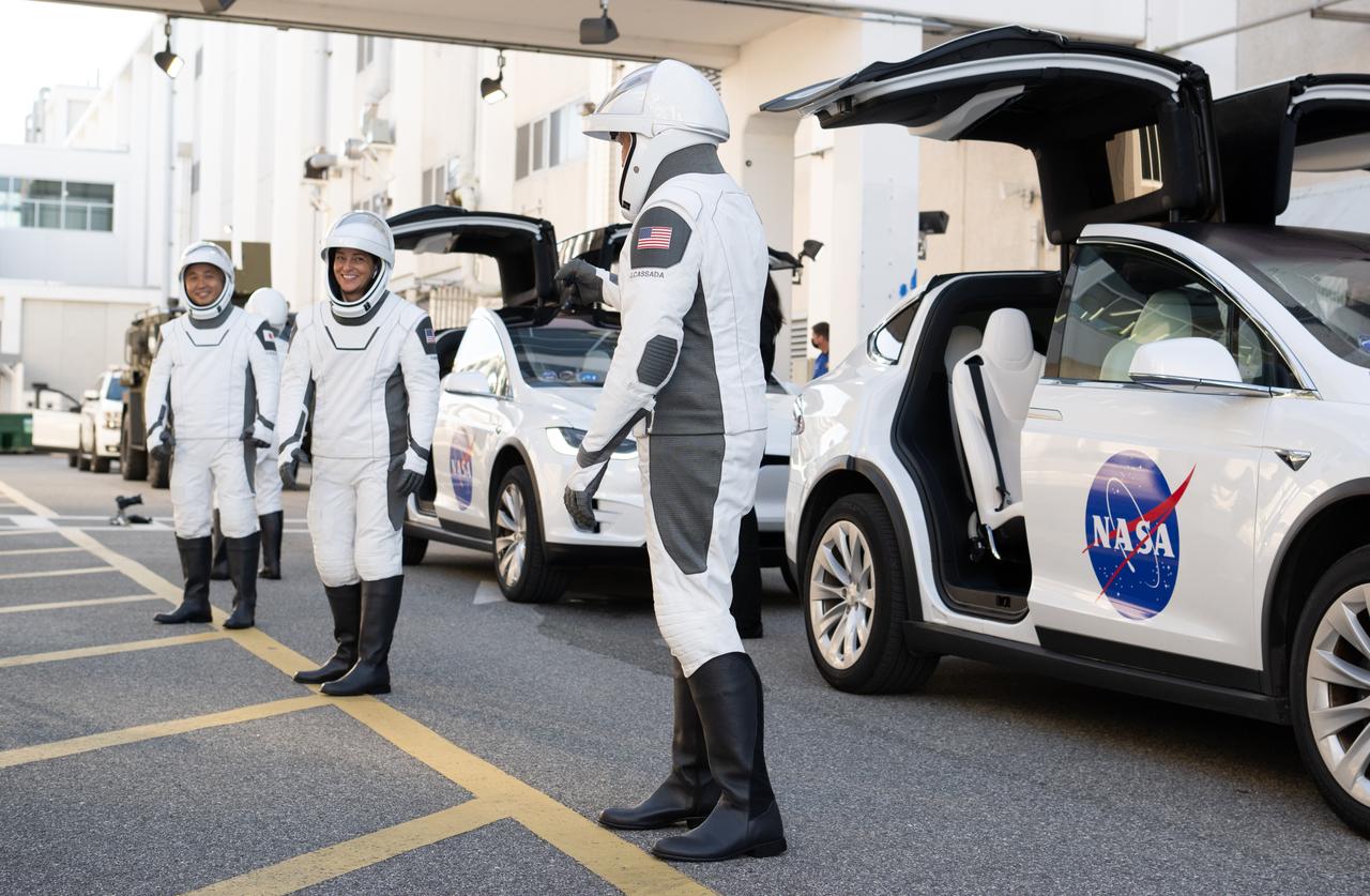NASA astronauts Josh Cassada and Nicole Mann, Japan Aerospace Exploration Agency (JAXA) astronaut Koichi Wakata, and Roscosmos cosmonaut Anna Kikina, wearing SpaceX spacesuits, are seen as they prepare to depart the Neil  A. Armstrong Operations and Checkout Building for Launch Complex 39A during a dress rehearsal prior to the Crew-5 mission launch, Sunday, Oct. 2, 2022, at NASA’s Kennedy Space Center in Florida. NASA’s SpaceX Crew-5 mission is the fifth crew rotation mission of the SpaceX Crew Dragon spacecraft and Falcon 9 rocket to the International Space Station as part of the agency’s Commercial Crew Program. Mann, Cassada, Wakata, and Kikini are scheduled to launch at 12:00 p.m. EDT on Oct. 5, from Launch Complex 39A at the Kennedy Space Center. Photo Credit: (NASA/Joel Kowsky)