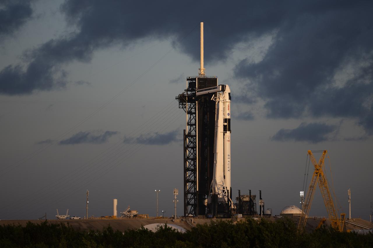 A SpaceX Falcon 9 rocket with the company's Crew Dragon spacecraft onboard is seen on the launch pad at Launch Complex 39A as preparations continue for the Crew-5 mission, Tuesday, Oct. 4, 2022, at NASA’s Kennedy Space Center in Florida. NASA’s SpaceX Crew-5 mission is the fifth crew rotation mission of the SpaceX Crew Dragon spacecraft and Falcon 9 rocket to the International Space Station as part of the agency’s Commercial Crew Program. NASA astronauts Nicole Mann and Josh Cassada, Japan Aerospace Exploration Agency (JAXA) astronaut Koichi Wakata, and Roscosmos cosmonaut Anna Kikina are scheduled to launch at 12:00 p.m. EDT on Oct. 5 from Launch Complex 39A at the Kennedy Space Center. Photo Credit: (NASA/Joel Kowsky)