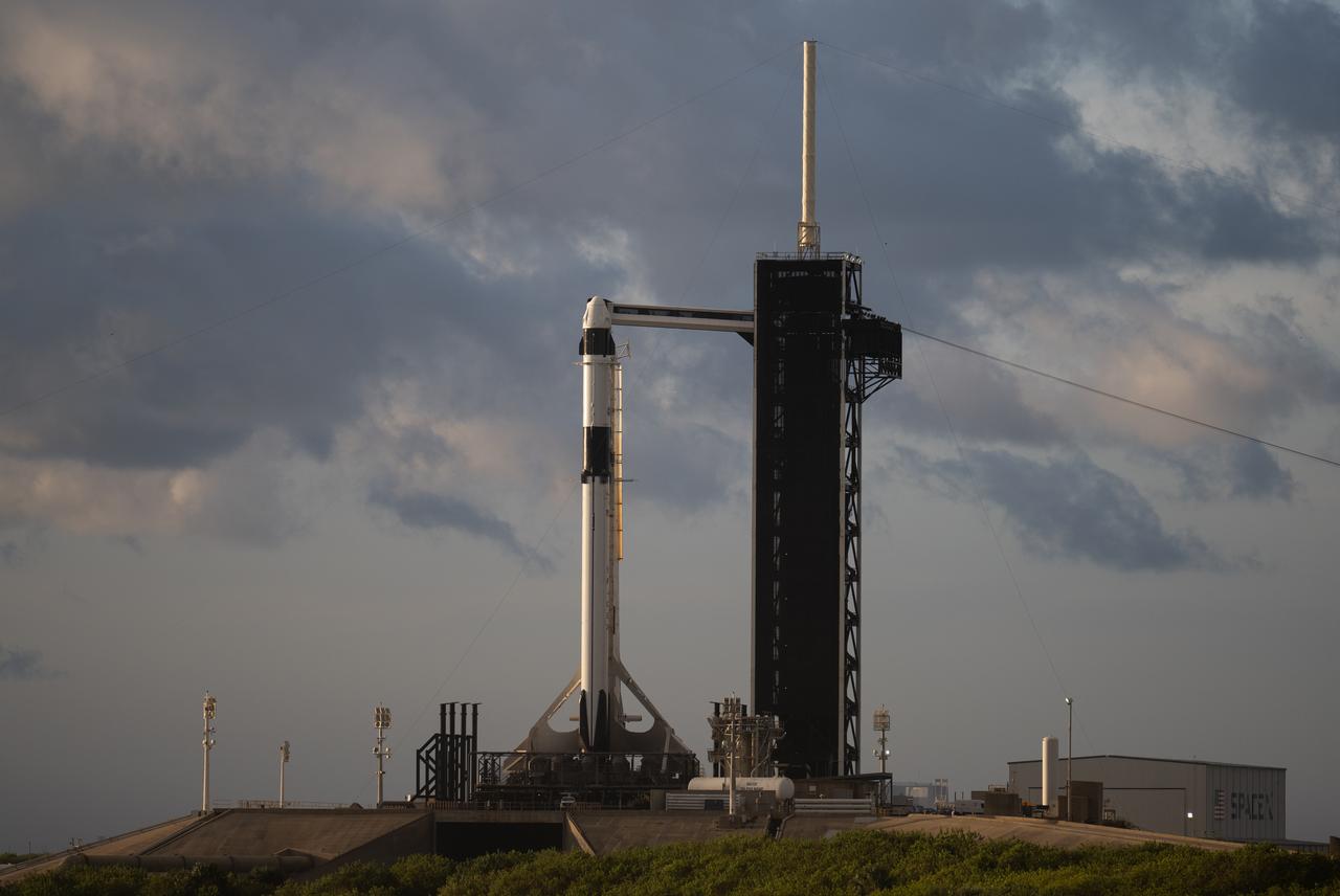 A SpaceX Falcon 9 rocket with the company's Crew Dragon spacecraft onboard is seen on the launch pad at Launch Complex 39A as preparations continue for the Crew-5 mission, Tuesday, Oct. 4, 2022, at NASA’s Kennedy Space Center in Florida. NASA’s SpaceX Crew-5 mission is the fifth crew rotation mission of the SpaceX Crew Dragon spacecraft and Falcon 9 rocket to the International Space Station as part of the agency’s Commercial Crew Program. NASA astronauts Nicole Mann and Josh Cassada, Japan Aerospace Exploration Agency (JAXA) astronaut Koichi Wakata, and Roscosmos cosmonaut Anna Kikina are scheduled to launch at 12:00 p.m. EDT on Oct. 5 from Launch Complex 39A at the Kennedy Space Center. Photo Credit: (NASA/Joel Kowsky)