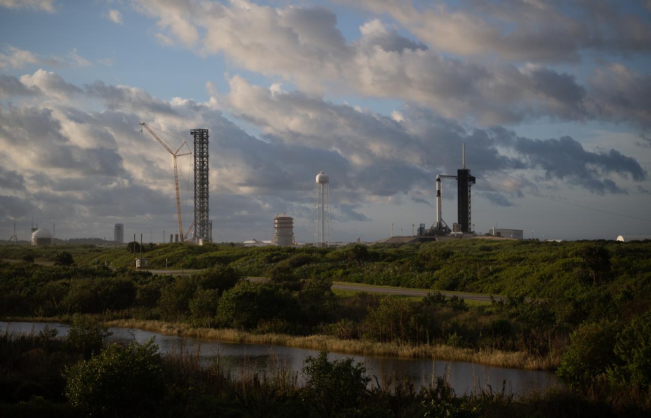 A SpaceX Falcon 9 rocket with the company's Crew Dragon spacecraft onboard is seen on the launch pad at Launch Complex 39A as preparations continue for the Crew-5 mission, Tuesday, Oct. 4, 2022, at NASA’s Kennedy Space Center in Florida. NASA’s SpaceX Crew-5 mission is the fifth crew rotation mission of the SpaceX Crew Dragon spacecraft and Falcon 9 rocket to the International Space Station as part of the agency’s Commercial Crew Program. NASA astronauts Nicole Mann and Josh Cassada, Japan Aerospace Exploration Agency (JAXA) astronaut Koichi Wakata, and Roscosmos cosmonaut Anna Kikina are scheduled to launch at 12:00 p.m. EDT on Oct. 5 from Launch Complex 39A at the Kennedy Space Center. Photo Credit: (NASA/Joel Kowsky)