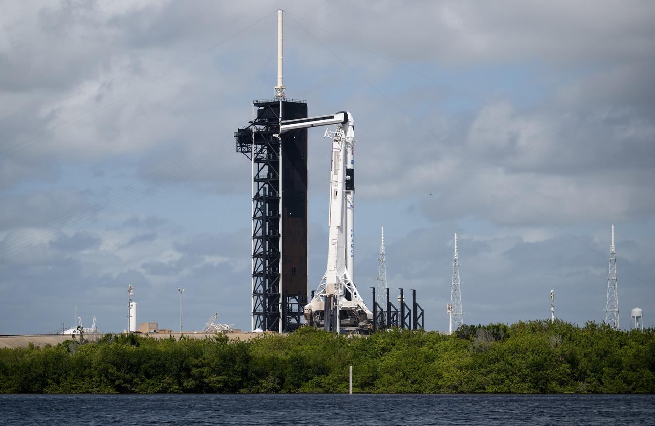 A SpaceX Falcon 9 rocket with the company's Crew Dragon spacecraft onboard is seen on the launch pad at Launch Complex 39A as preparations continue for the Crew-5 mission, Tuesday, Oct. 4, 2022, at NASA’s Kennedy Space Center in Florida. NASA’s SpaceX Crew-5 mission is the fifth crew rotation mission of the SpaceX Crew Dragon spacecraft and Falcon 9 rocket to the International Space Station as part of the agency’s Commercial Crew Program. NASA astronauts Nicole Mann and Josh Cassada, Japan Aerospace Exploration Agency (JAXA) astronaut Koichi Wakata, and Roscosmos cosmonaut Anna Kikina are scheduled to launch at 12:00 p.m. EDT on Oct. 5 from Launch Complex 39A at the Kennedy Space Center. Photo Credit: (NASA/Joel Kowsky)