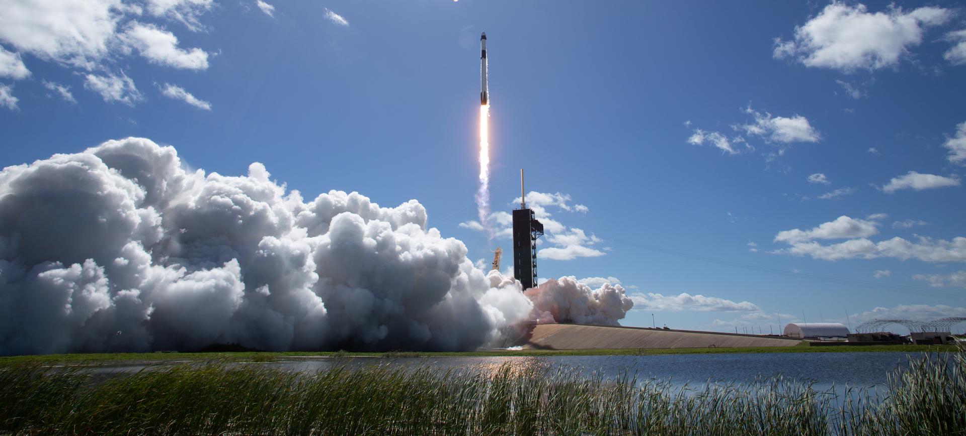 Plume fills the sky following a rocket launch at Kennedy's Space Center in Florida.