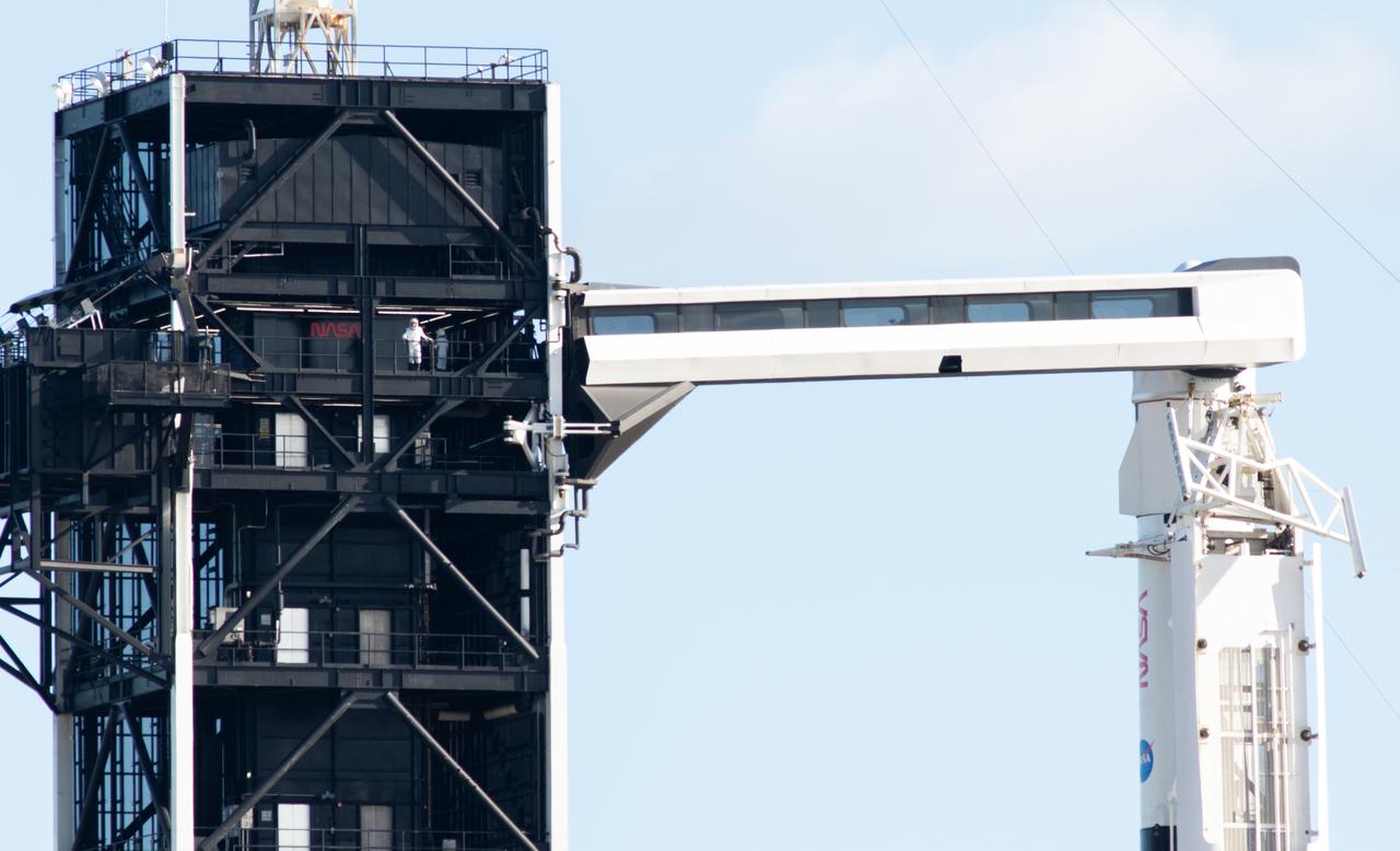 NASA astronaut Josh Cassada, left, and Nicole Mann, are seen on the fixed service structure of Launch Complex 39A before boarding SpaceX’s Crew Dragon spacecraft atop the company’s Falcon 9 rocket before the launch of NASA’s SpaceX Crew-5 mission to the International Space Station, Wednesday, Oct. 5, 2022, at NASA’s Kennedy Space Center in Florida. NASA’s SpaceX Crew-5 mission is the fifth crew rotation mission of the SpaceX Crew Dragon spacecraft and Falcon 9 rocket to the International Space Station as part of the agency’s Commercial Crew Program. Cassada, Mann, Japan Aerospace Exploration Agency (JAXA) astronaut Koichi Wakata, and Roscosmos cosmonaut Anna Kikina launched at 12:00 p.m. EDT from Launch Complex 39A at the Kennedy Space Center to begin a six month mission onboard the orbital outpost. Photo Credit: (NASA/Joel Kowsky)