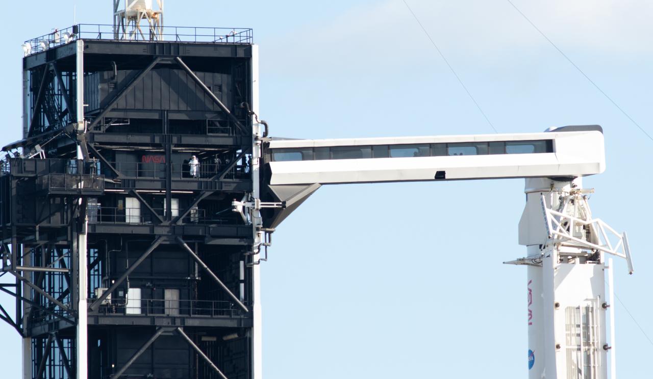 Japan Aerospace Exploration Agency (JAXA) astronaut Koichi Wakata, left, and Roscosmos cosmonaut Anna Kikina, are seen on the fixed service structure of Launch Complex 39A before boarding SpaceX’s Crew Dragon spacecraft atop the company’s Falcon 9 rocket before the launch of NASA’s SpaceX Crew-5 mission to the International Space Station, Wednesday, Oct. 5, 2022, at NASA’s Kennedy Space Center in Florida. NASA’s SpaceX Crew-5 mission is the fifth crew rotation mission of the SpaceX Crew Dragon spacecraft and Falcon 9 rocket to the International Space Station as part of the agency’s Commercial Crew Program. Cassada, Mann, Japan Aerospace Exploration Agency (JAXA) astronaut Koichi Wakata, and Roscosmos cosmonaut Anna Kikina launched at 12:00 p.m. EDT from Launch Complex 39A at the Kennedy Space Center to begin a six month mission onboard the orbital outpost. Photo Credit: (NASA/Joel Kowsky)