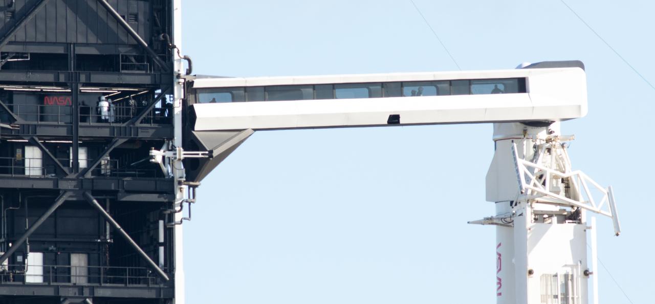 NASA astronaut Josh Cassada and Nicole Mann, are seen in the crew access arm while Japan Aerospace Exploration Agency (JAXA) astronaut Koichi Wakata and Roscosmos cosmonaut Anna Kikina are seen on the fixed service structure of Launch Complex 39A as they prepare to board SpaceX’s Crew Dragon spacecraft atop the company’s Falcon 9 rocket before the launch of NASA’s SpaceX Crew-5 mission to the International Space Station, Wednesday, Oct. 5, 2022, at NASA’s Kennedy Space Center in Florida. NASA’s SpaceX Crew-5 mission is the fifth crew rotation mission of the SpaceX Crew Dragon spacecraft and Falcon 9 rocket to the International Space Station as part of the agency’s Commercial Crew Program. Cassada, Mann, Japan Aerospace Exploration Agency (JAXA) astronaut Koichi Wakata, and Roscosmos cosmonaut Anna Kikina launched at 12:00 p.m. EDT from Launch Complex 39A at the Kennedy Space Center to begin a six month mission onboard the orbital outpost. Photo Credit: (NASA/Joel Kowsky)