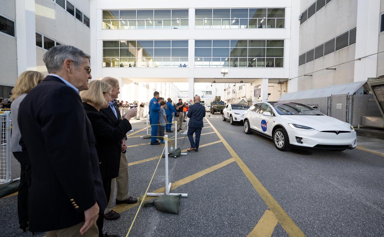 Bob Cabana, NASA associate administrator, left, NASA Deputy Administrator Pam Melroy, center, and NASA Administrator Bill Nelson, right, watch as NASA astronauts Nicole Mann and Josh Cassada, Japan Aerospace Exploration Agency (JAXA) astronaut Koichi Wakata, and Roscosmos cosmonaut Anna Kikina depart the Neil  A. Armstrong Operations and Checkout Building for Launch Complex 39A to board the SpaceX Crew Dragon spacecraft for the Crew-5 mission launch, Wednesday, Oct. 5, 2022, at NASA’s Kennedy Space Center in Florida. NASA’s SpaceX Crew-5 mission is the third crew rotation mission of the SpaceX Crew Dragon spacecraft and Falcon 9 rocket to the International Space Station as part of the agency’s Commercial Crew Program. NASA astronauts Nicole Mann and Josh Cassada, Japan Aerospace Exploration Agency (JAXA) astronaut Koichi Wakata, and Roscosmos cosmonaut Anna Kikina launched at 12:00 p.m. EDT from Launch Complex 39A at the Kennedy Space Center. Photo Credit: (NASA/Joel Kowsky)